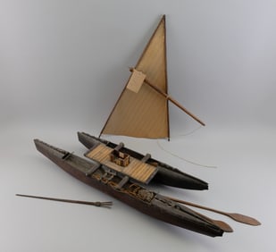 MODEL OF A SOUTH SEAS WOODEN CANOE Early 20th Century Height 23.25". Length 34". Width 10".