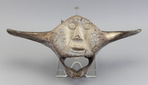 INUIT RELIEF-CARVED BLACKFISH VERTEBRA Early 20th Century Height 8". Width 19". Depth 3".