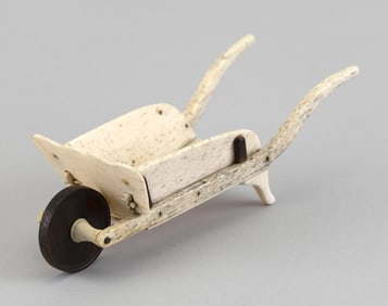 MINIATURE WHALEBONE WHEELBARROW 19th Century Height 2". Length 7".