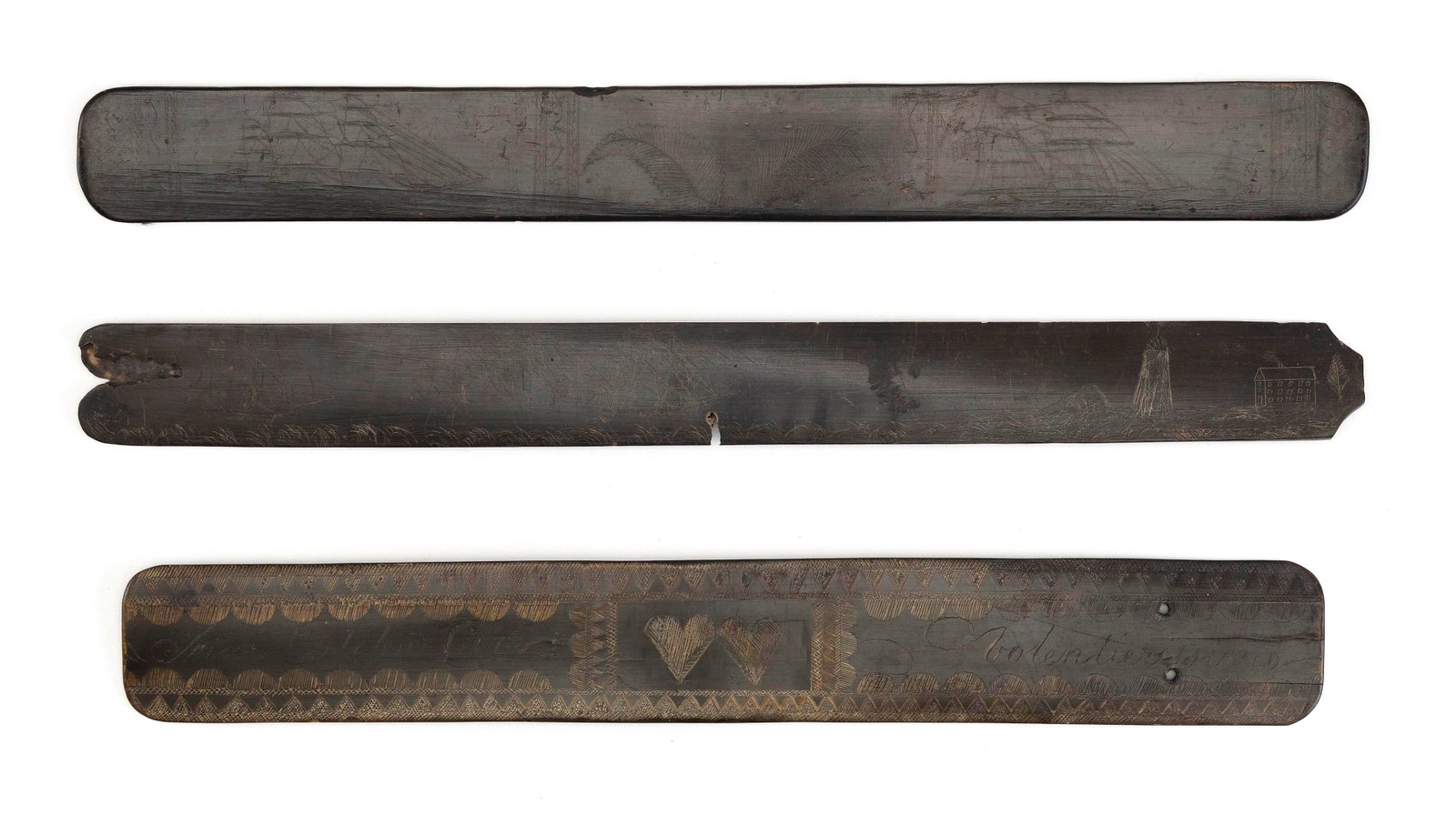 THREE SCRIMSHAW BALEEN BUSKS 19th Century Lengths from 13" to 14".: THREE SCRIMSHAW BALEEN BUSKS 19th Century Maritime and romantic designs. Lengths from 13" to 14".