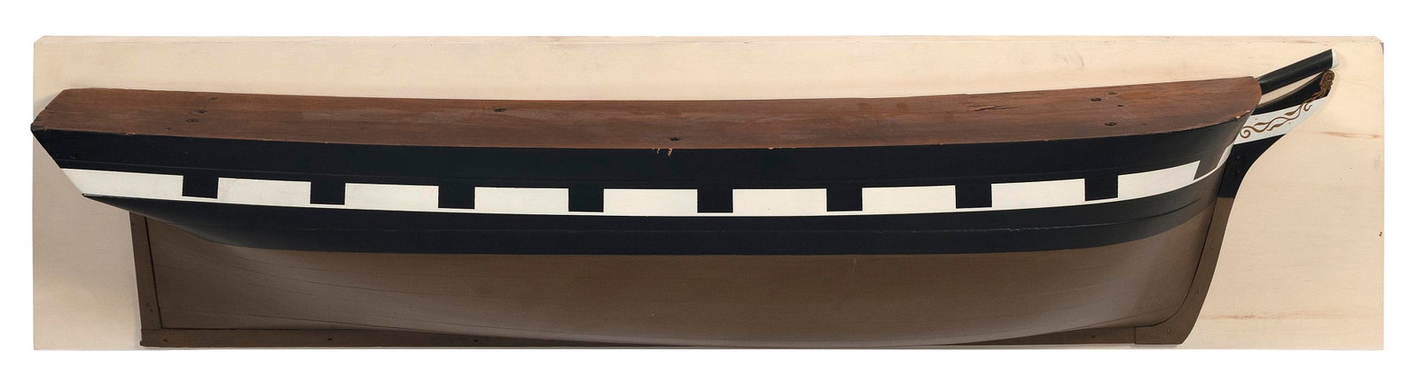MOUNTED BUILDER'S HALF HULL MODEL 19th Century Backboard 14" x 63".: MOUNTED BUILDER'S HALF HULL MODEL 19th Century Built up in ten lifts. Applied sprit, bow and skeg. Backboard and hull repainted. Backboard 14" x 63". Provenance: Deaccessioned by the Old Dartmouth His