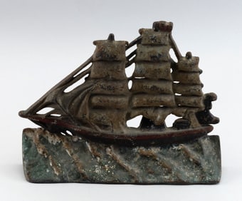 NATIONAL FOUNDRY CLIPPER SHIP DOORSTOP, Circa 1920s Height 9.5". Width 12".