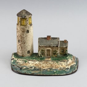 NATIONAL FOUNDRY CAPE COD LIGHTHOUSE KEEPER'S COTTAGE CAST IRON DOORSTOP Circa 1920s Height 6.25".