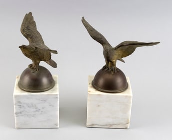 PAIR OF BRASS EAGLE FINIALS First Half of the 20th Century Total heights 10.25". Wingspans 8".