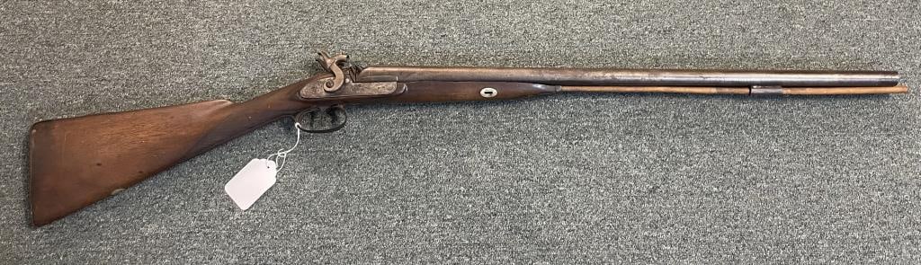 DAMASCUS-BARRELED SHOTGUN 19th Century Length of barrels 27.5". Total length 43.5".: DAMASCUS-BARRELED SHOTGUN 19th Century 12-ga. Length of barrels 27.5". Total length 43.5".