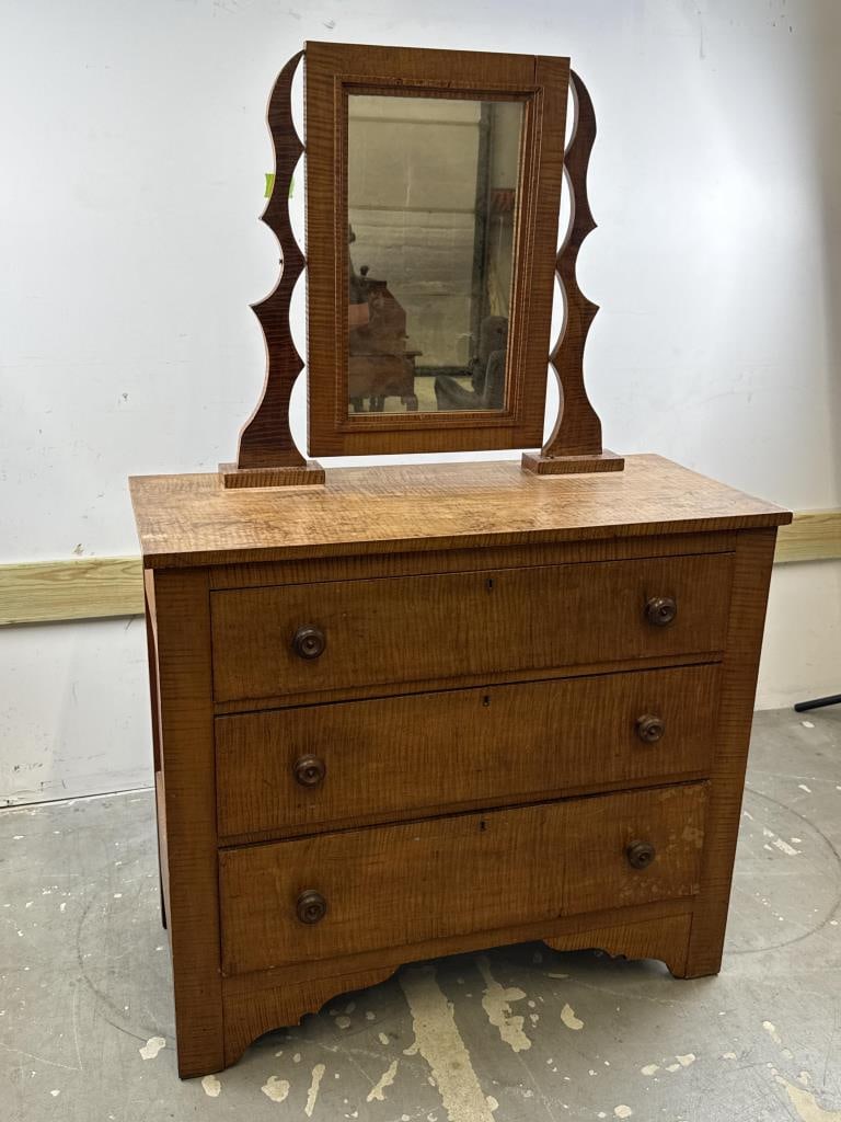 TIGER MAPLE BUREAU WITH DRESSING MIRROR 19th Century Height 36". Width 40". Depth 18".: TIGER MAPLE BUREAU WITH DRESSING MIRROR19th CenturyBureau with three drawers. Mirror with shaped mounting brackets.Height 36". Width 40". Depth 18".