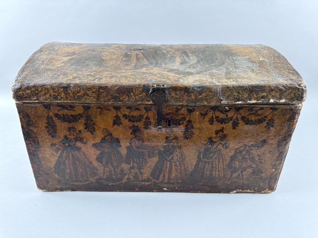 DECOUPAGED DOME-TOP TRUNK Early 20th Century Height 10.5". Width 18.5". Depth 13.25".: DECOUPAGED DOME-TOP TRUNKEarly 20th CenturyHeight 10.5". Width 18.5". Depth 13.25".