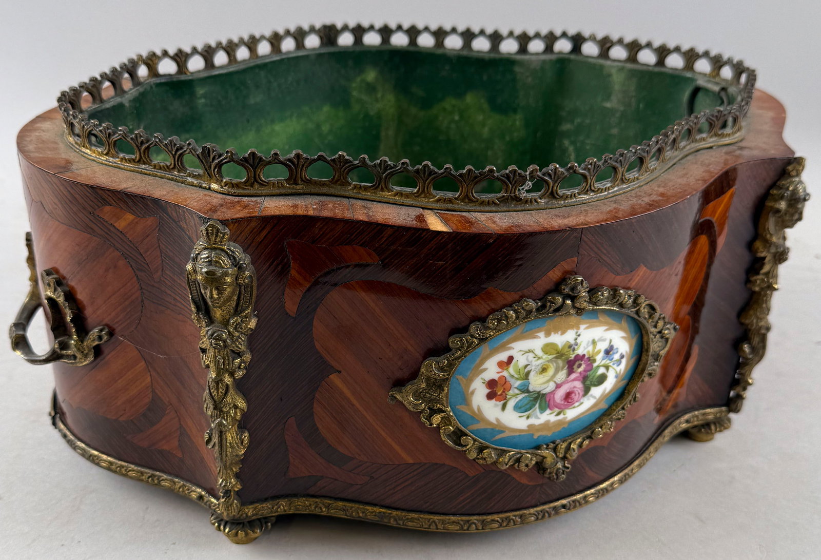 NAPOLEON III TURTLE-SHAPED PLANTER France, 19th Century Height 6.5". Length 15.5". Width 10.5".: NAPOLEON III TURTLE-SHAPED PLANTERFrance, 19th CenturyEmbellished with ormolu mounts, a Sevres-type floral porcelain plaque and multicolored veneer. Original tin insert painted green.Height 6.5". Leng