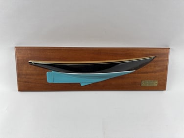 MOUNTED HALF HULL OF A BERMUDA 40 America, 20th Century Backboard 7.25" x 25.25".