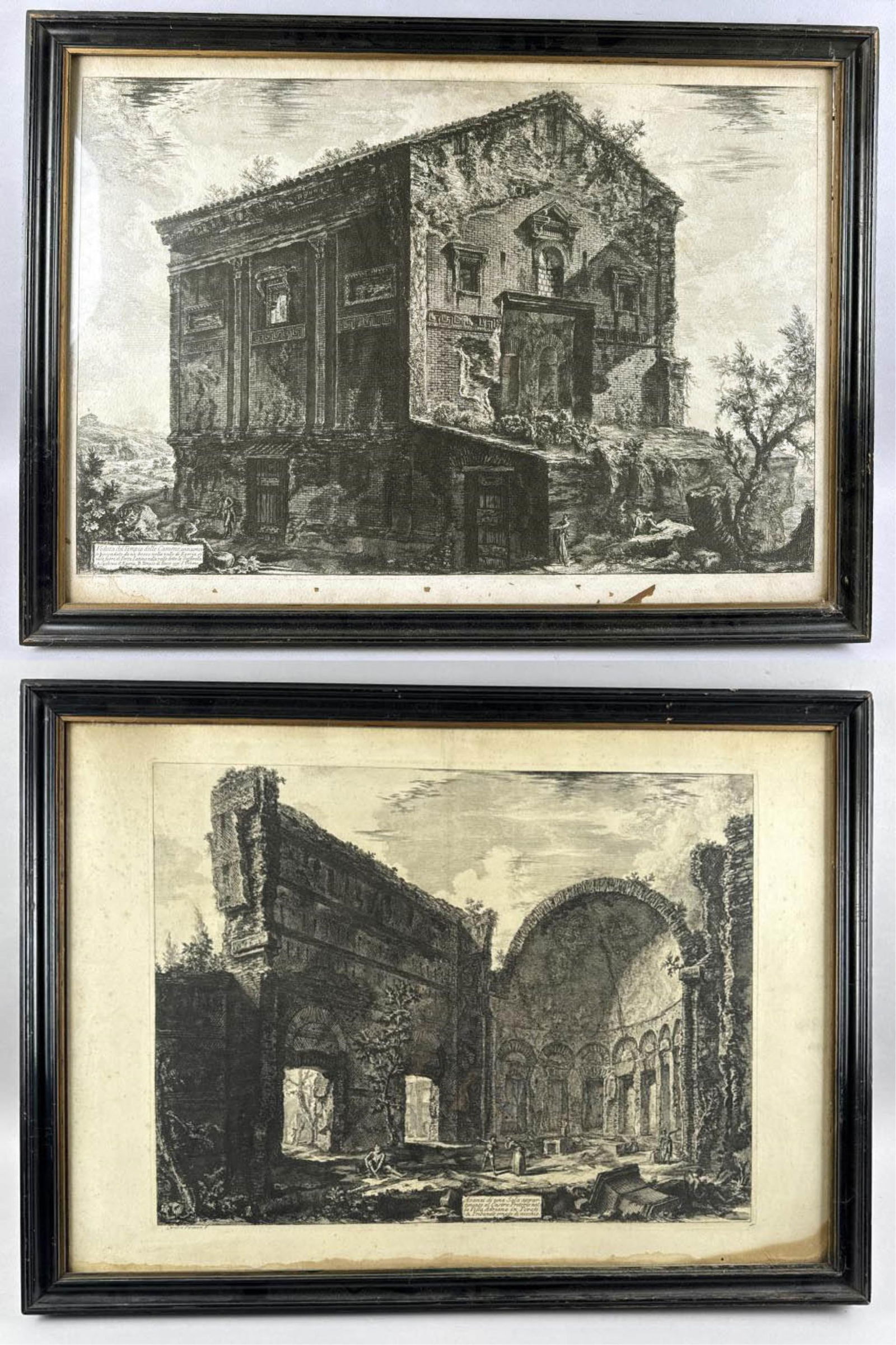 GIOVANNI BATTISTA PIRANESI (Italy, 1720-1778), Two views of ruins:, Engravings, 20" x 26.75" sight.: GIOVANNI BATTISTA PIRANESIItaly, 1720-1778Two views of ruins: "Vedutta del Tempio delle Camene" and "Avanzi de una Sala Appartente [...]".Engravings, 20" x 26.75" sight. Framed 23.25" x 31.75".