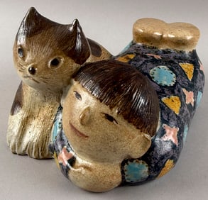 THOMAS (TOMMY) KAKINUMA (Canada/New York/Japan, 20th Century), Child with cat., Glazed stoneware,