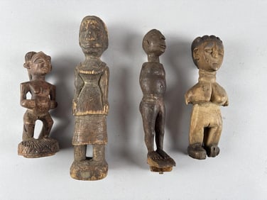FOUR SMALL AFRICAN FIGURAL CARVINGS Heights from 6.5" to 10.5".