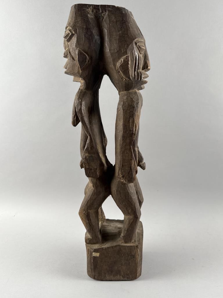 AFRICAN FERTILITY CARVING Height 25".: AFRICAN FERTILITY CARVING Formed as two figures facing in opposite directions. Height 25".