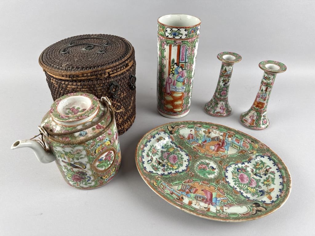 FIVE PIECES OF CHINESE ROSE MEDALLION PORCELAIN Late 19th/Early 20th Century: FIVE PIECES OF CHINESE ROSE MEDALLION PORCELAINLate 19th/Early 20th Century1-2) Pair of candlesticks. Heights 6.5".3) Cylinder vase. Height 9.5".4) Oval platter. Length 12".5) Teapot in a fitted baske