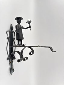 WROUGHT IRON AND TIN FIGURAL DOOR ORNAMENT 20th Century Height 18".