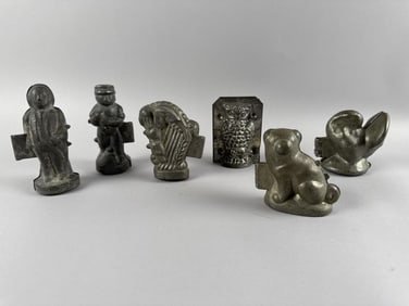 SIX PEWTER AND TIN DESSERT MOLDS Heights from 3" to 5".