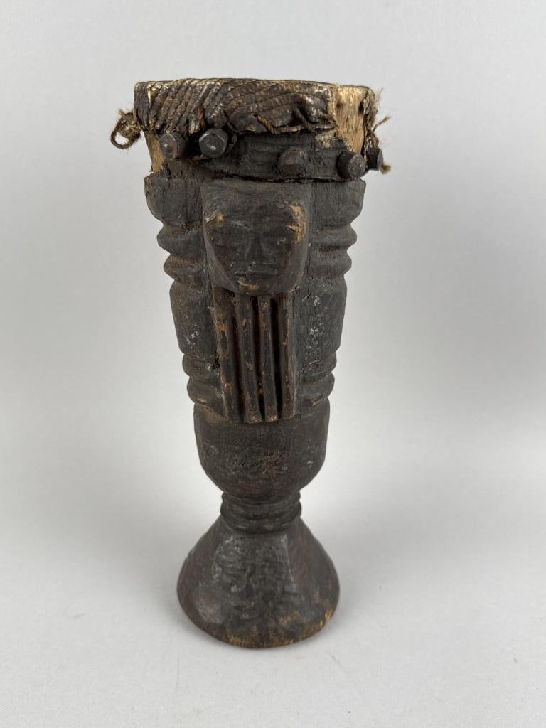 AFRICAN CAMEROONIAN CARVED CEREMONIAL DRUM Height 10".: AFRICAN CAMEROONIAN CARVED CEREMONIAL DRUMFigural design. Brown finish.Height 10".