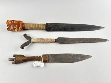 THREE ETHNOGRAPHIC KNIVES 19th/20th Century Lengths from 13" to 18".