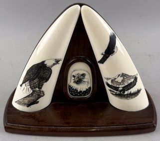 PAIR OF MOUNTED AND ENGRAVED SIMULATED WHALE'S TEETH 20th Century Height 7.5". Length 9.5". Depth