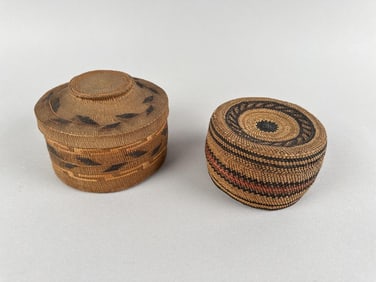 TWO NORTHWEST COASTAL WOVEN SPRUCE ROOT COVERED BASKETS Late 19th Century Diameters 4" and 4.75".