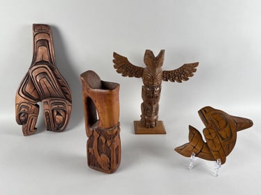 FOUR NORTHWEST COASTAL WOOD CARVINGS Late 20th Century Heights from 9" to 16".
