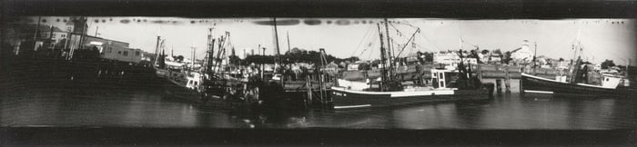 ATTRIBUTED TO MARIAN ROTH Massachusetts, 1944- Boats in Provincetown Harbor. No signature noted.