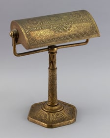 TIFFANY STUDIOS "ZODIAC" BRONZE DESK LAMP New York, Early 20th Century Height 13.25". Shade width
