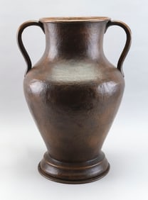 ARTS & CRAFTS HAND-HAMMERED COPPER AMPHORA VASE Early 20th Century Height 21.25". Width at handles