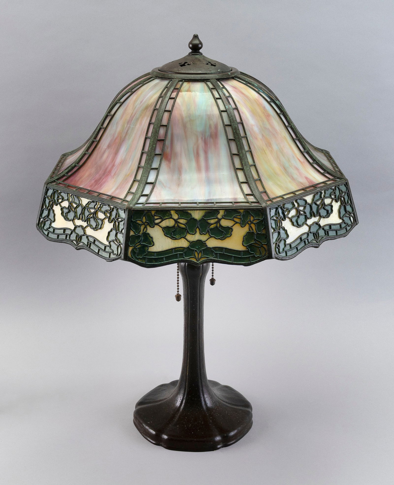 HANDEL BRONZE TABLE LAMP WITH RAINBOW SLAG GLASS SHADE Connecticut, Early 20th Century Height 22". (1 of 9)
