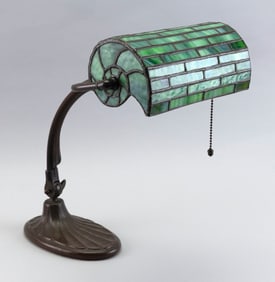 HANDEL BRONZE DESK LAMP WITH NAUTILUS LEADED GLASS SHADE Connecticut, Early 20th Century Height