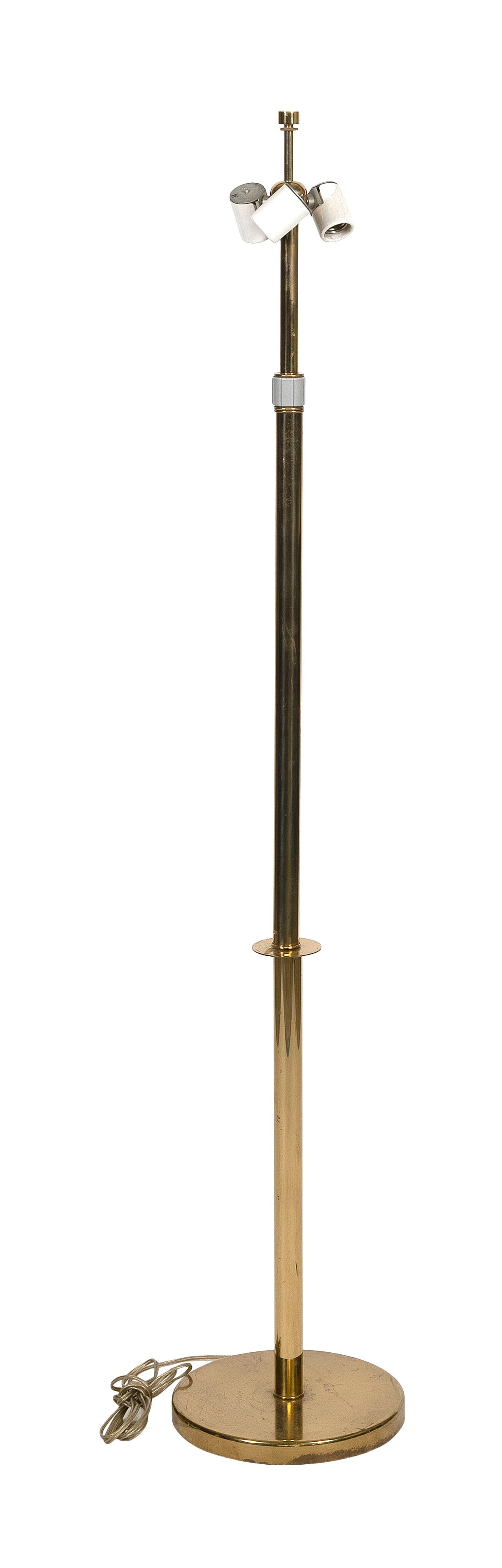 HANSEN LIGHTING CO. THREE-LIGHT FLOOR LAMP New York, 20th Century Height 56".: HANSEN LIGHTING CO. THREE-LIGHT FLOOR LAMPNew York, 20th CenturyBrass rod stem on a circular base. Three-way collar switch. Marked "Hansen NY".Height 56".