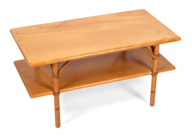 HEYWOOD-WAKEFIELD TWO-TIER TABLE America, Mid-20th Century Height 17". Length 34". Width 18".