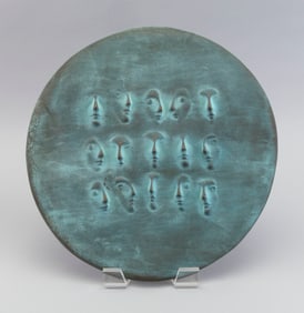 LINDLEY BRIGGS (Massachusetts, Contemporary), Faces in relief., Bronze medallion, diameter 15".