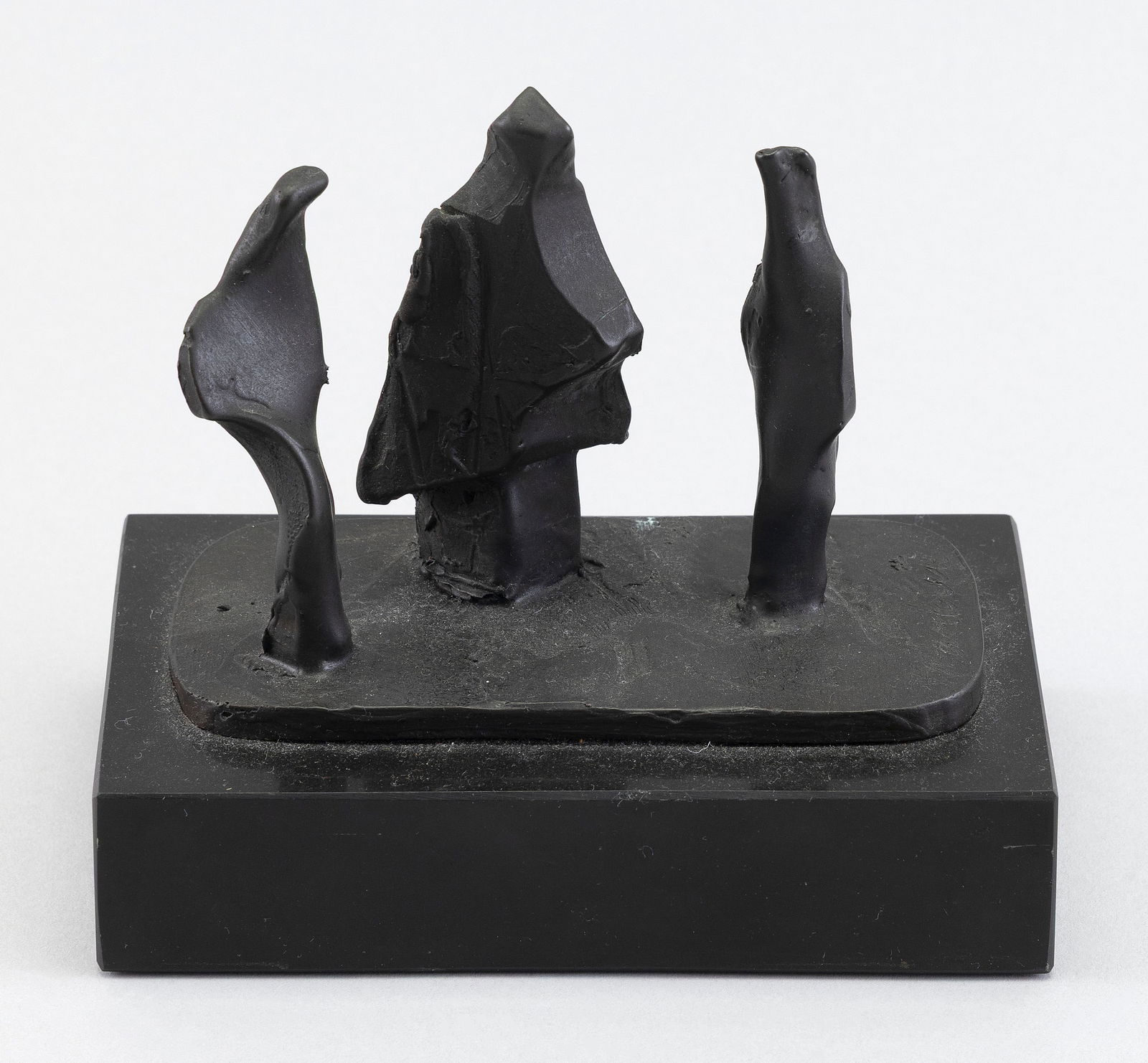 GILBERT A. FRANKLIN (Rhode Island, 1919-2004), Three abstract figures., Bronze, height 3". Length: GILBERT A. FRANKLINRhode Island, 1919-2004Three abstract figures. Signed on base "Franklin".Bronze, height 3". Length 5.25". Width 3.25". On a black marble base.