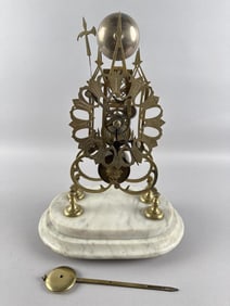 ENGLISH GOTHIC REVIVAL BRASS SKELETON CLOCK Circa 1900 Height 16". Width 11". Depth 8".