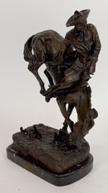 BRONZE AFTER FREDRICK REMINGTON'S "OUTLAW" 20th Century Total height 22".