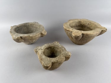 THREE CARVED STONE MORTARS 19th or 20th Century Heights from 3.5" to 5". Widths from 7" to 11".