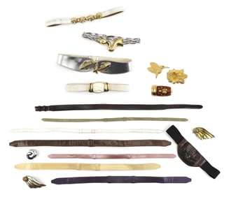 TWELVE BELTS AND SIX BELT BUCKLES 20th Century Belt lengths from 29.5" to 37". Buckle heights from