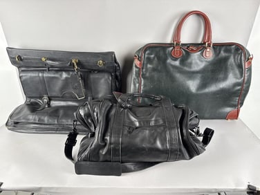 THREE LEATHER TRAVEL BAGS America, 21st Century