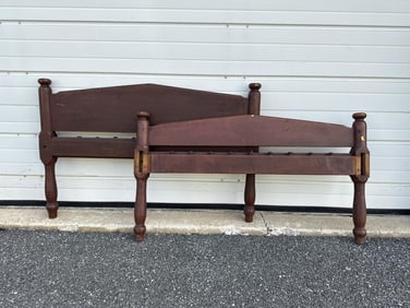 RUDIMENTARY BED IN RED FINISH 19th Century Height 31". Width across bolt holes 46.5".