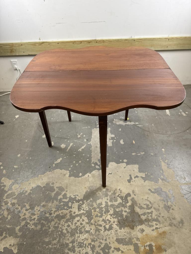 HEPPLEWHITE-STYLE SERPENTINE CARD TABLE Late 19th Century Height 29.5". Width 35.5". Depth 17". (1 of 4)