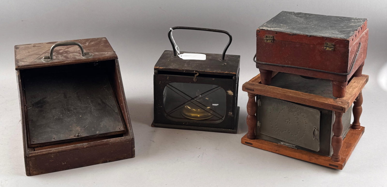 FOUR WOOD AND TIN FOOT WARMERS AND HEATERS 19th/Early 20th Century Heights to 10". Widths to 9".: FOUR WOOD AND TIN FOOT WARMERS AND HEATERS 19th/Early 20th Century One stenciled "D.L. Jaques". Heights to 10". Widths to 9". Depths to 13". Provenance: William Dixon Collection.