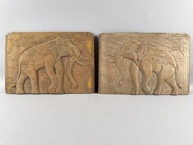 PAIR OF RELIEF-CARVED PANELS DEPICTING ELEPHANTS Early 20th Century Both approx. 11.5" x 17".
