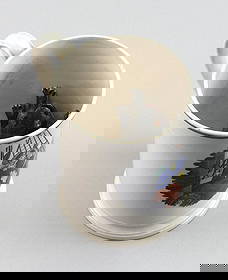 BRITISH PEARLWARE FROG MUG WITH SCARCE TRANSFER OF A SAILOR, Circa 1800 Height 5".: BRITISH PEARLWARE FROG MUG WITH SCARCE TRANSFER OF A SAILORCirca 1800Depicts a wistful sailor onboard a ship, holding a letter from his sweetheart in one hand and a portrait miniature of her in the ot