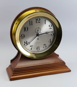 CHELSEA CLOCK CO. 12" DIAL PILOT HOUSE CLOCK Boston, 20th Century Height on mahogany base 19.25".