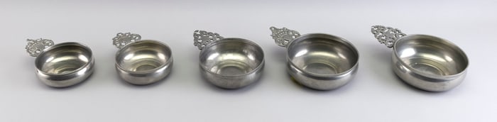 FIVE PEWTER PORRINGERS England and America, 18th and Early 19th Century Lengths from 6" to 7.75".