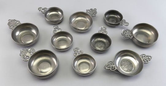 TEN PEWTER PORRINGERS England and America, 18th/Early 19th Century Lengths from 4.75" to 7.75".