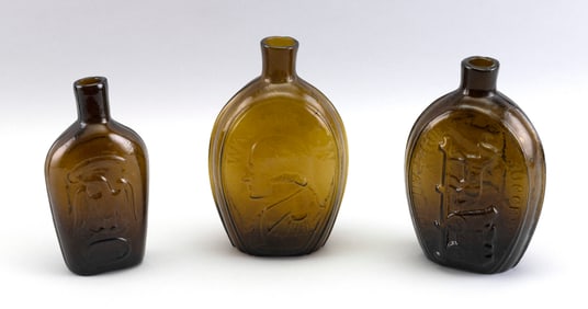 THREE OLIVE GREEN GLASS FLASKS 19th Century Heights from 6" to 7".