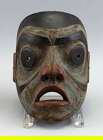 NORTHWEST COASTAL CARVED WOODEN STORYTELLER'S MASK First Quarter of the 20th Century Height 8.75".: NORTHWEST COASTAL CARVED WOODEN STORYTELLER'S MASKFirst Quarter of the 20th CenturyUsed in a potlach. Original paint with some wear. Retains old tag and card from the Old Alaska Shop, Haines, Alaska.H