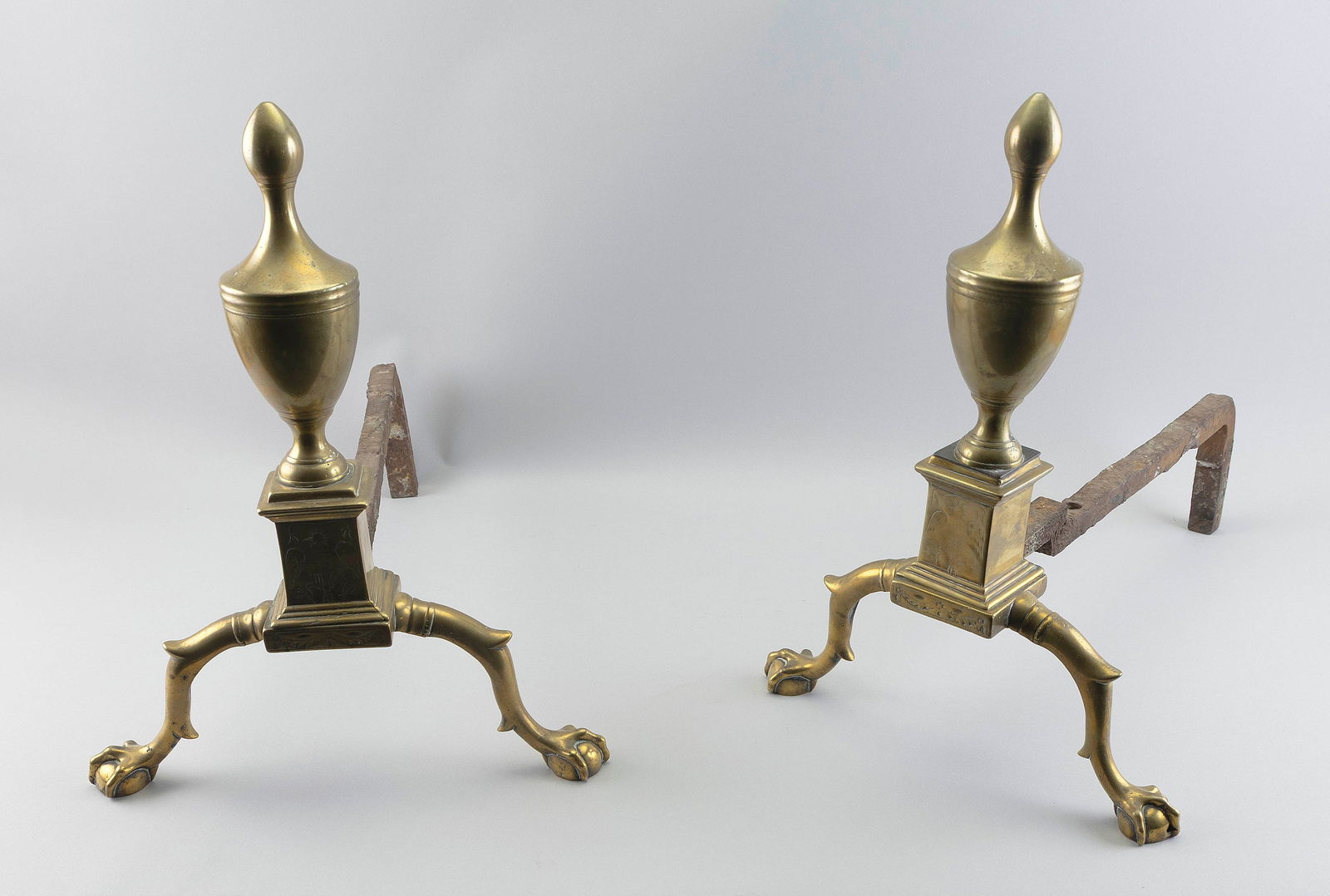 PAIR OF ENGRAVED BRASS ANDIRONS Late 18th Century Heights 18.25". Depths 22". (1 of 2)